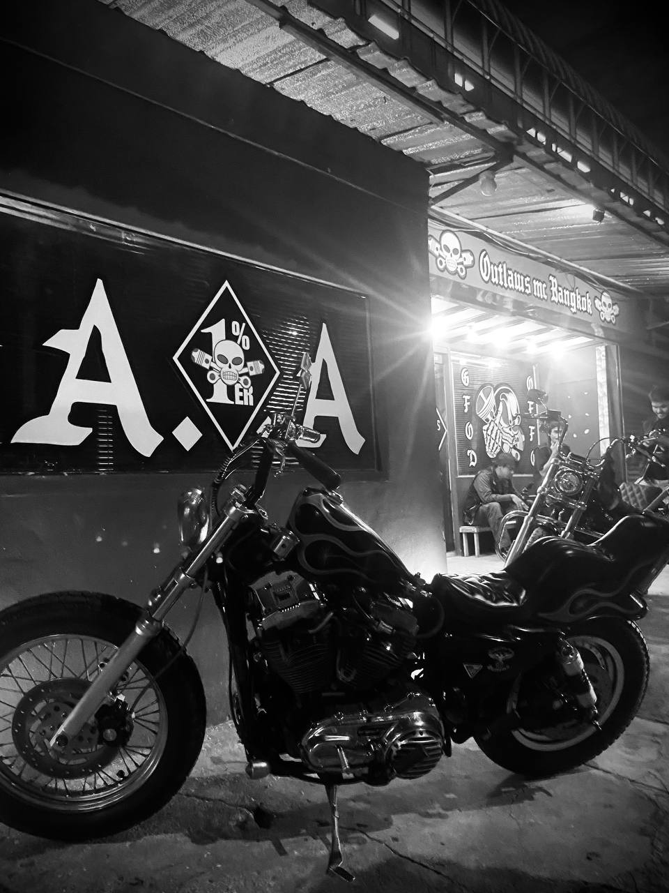 Crazy Frank Chopper in front of the Outlaws MC Bangkok Clubhouse.