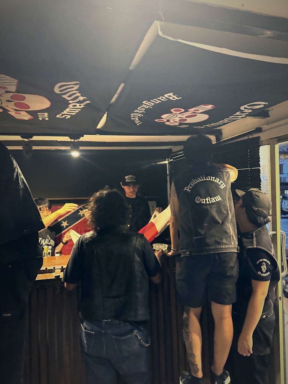Probate and SYLO working together to decorate the Outlaws MC Bangkok Clubhouse.