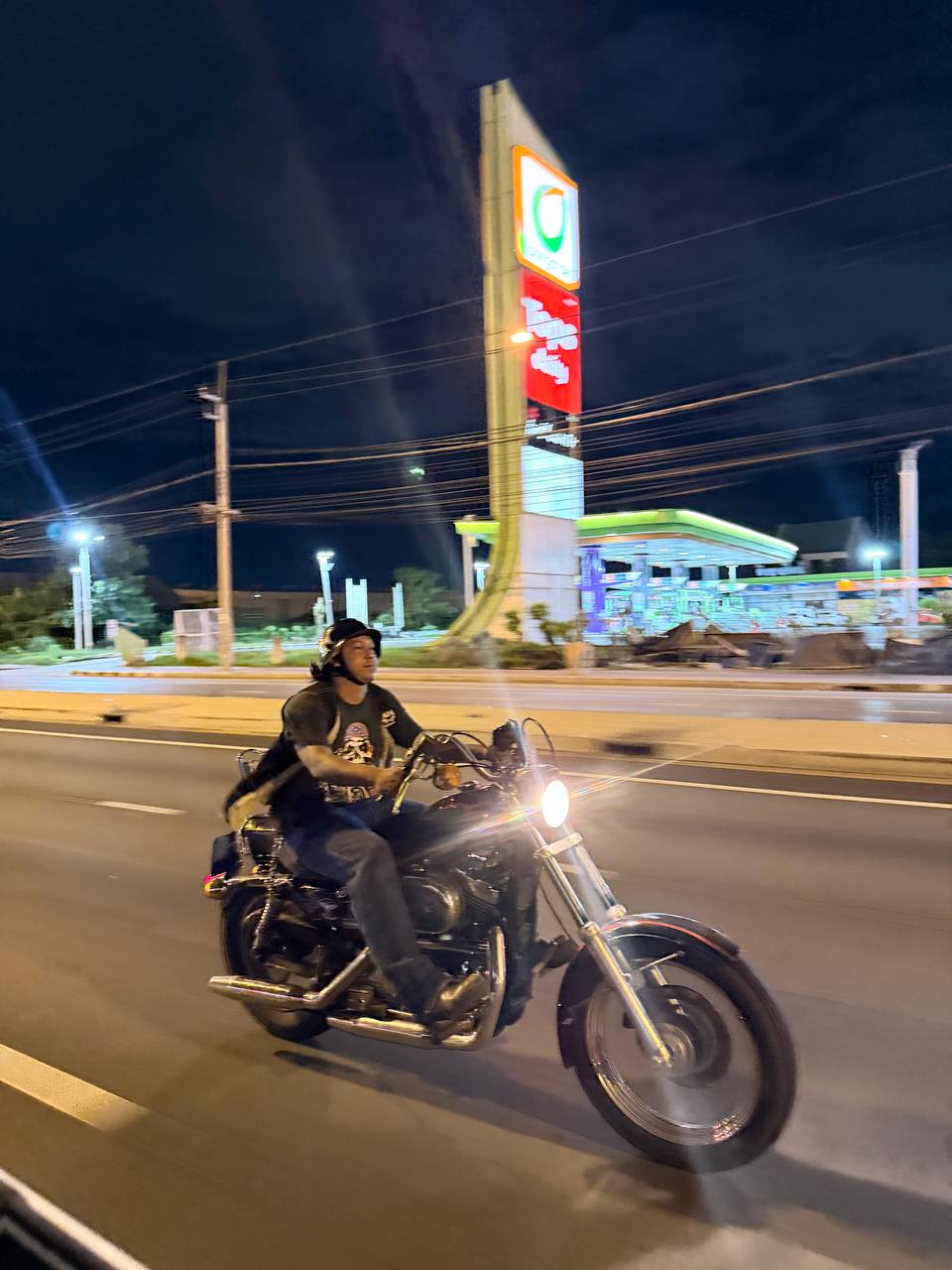 S.Y.L.O. Nus and his Sportster.
